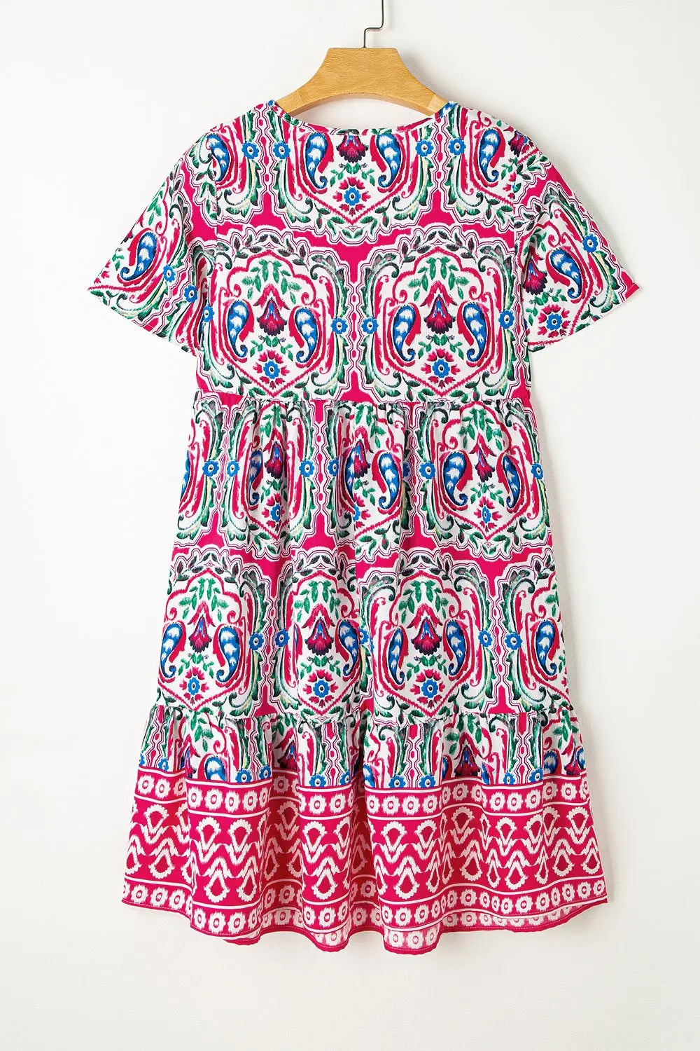 Pink and white tribal print tiered babydoll dress with tie neck short sleeves