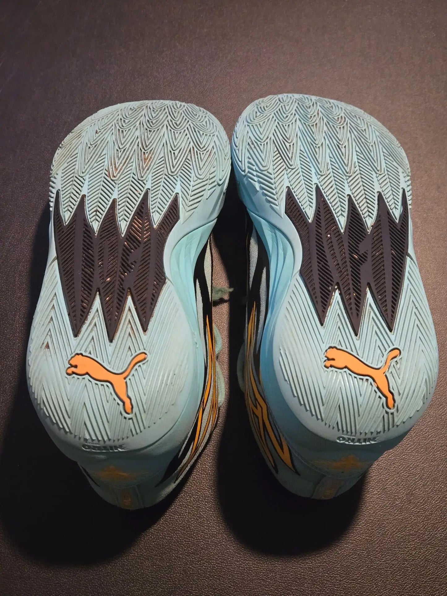Light blue and black Puma Basketball Shoes Men’s 7 aqua teal yellow sneakers soles