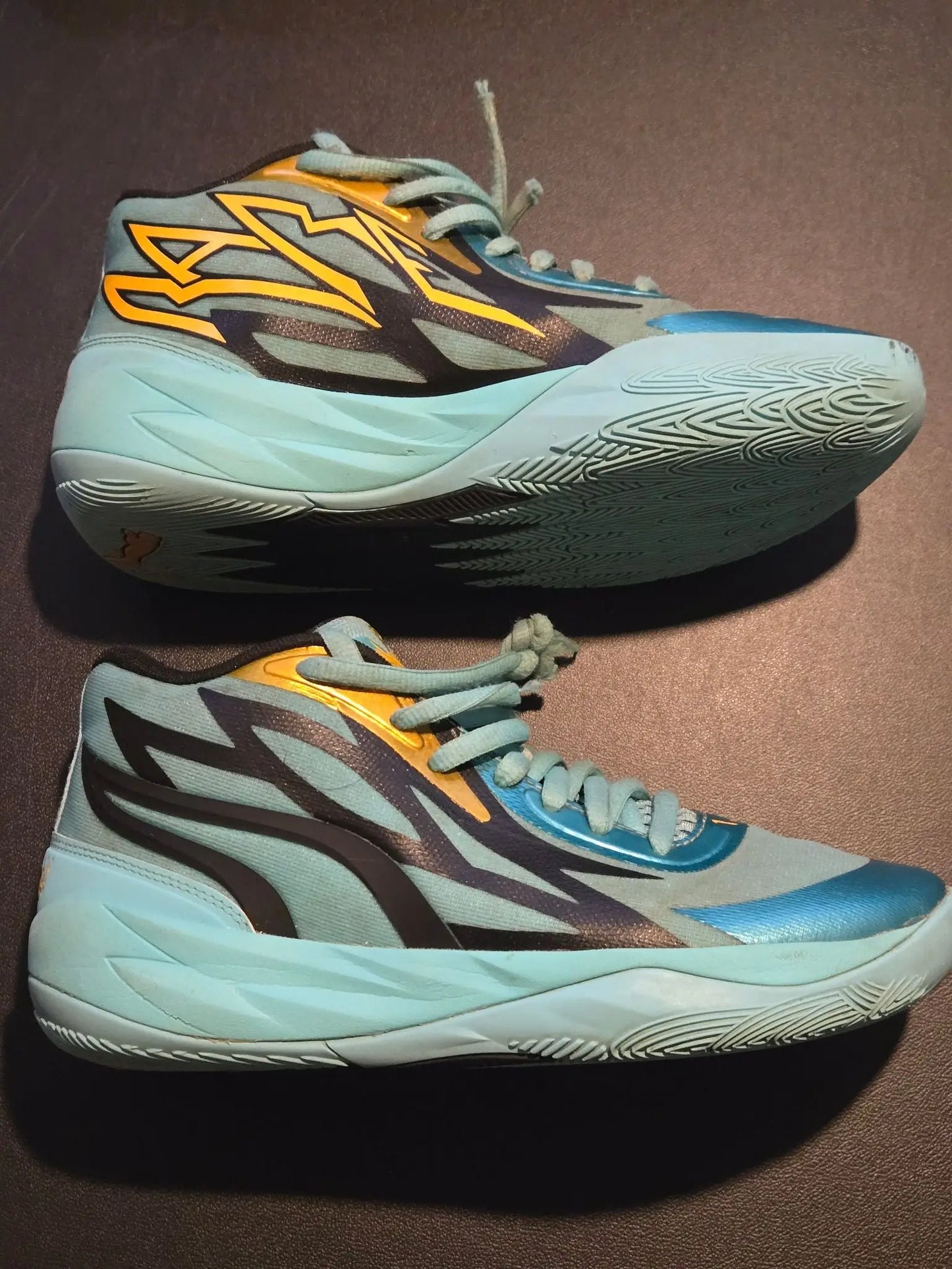 Light blue and gold Puma Basketball Shoes Men’s 7 Aqua Teal lightweight sneakers