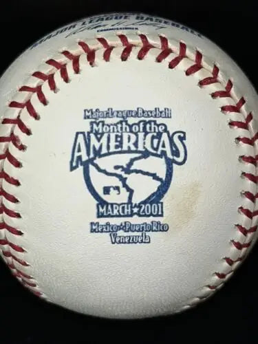 Rawlings OMLB 2001 baseball with red stitching celebrating Americas baseball and Puerto Rico