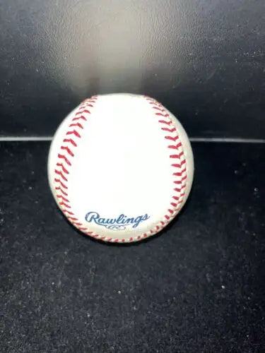 Rawlings OMLB 2001 baseball featuring red stitching, celebrating Americas baseball in Puerto Rico