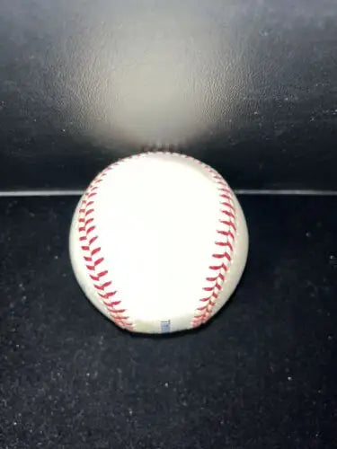 White baseball with red stitching from the Rawlings Americas Baseball series, featuring Puerto Rico