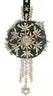 Dark green circular ornament with silver pink embroidery and beaded tassels from Cracker Box ornament kit