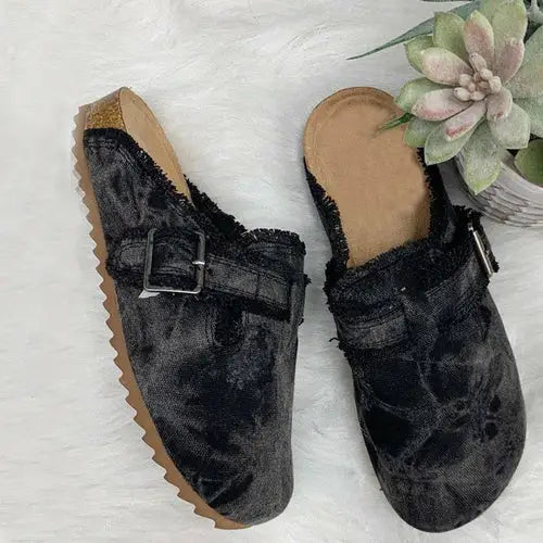 Black distressed velvet mules with buckle straps and ridged soles on RetroCharm Canvas Loafer Clogs