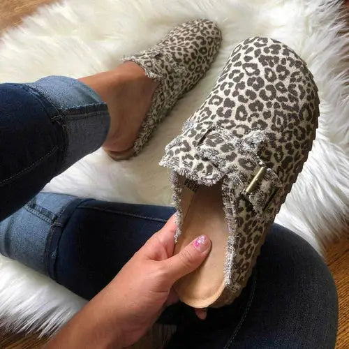 Leopard print retrocharm canvas loafer clogs with frayed edges and buckle detail