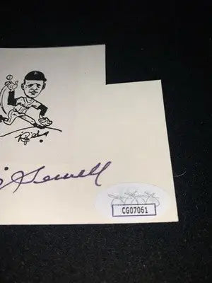 Autographed cartoon baseball of Rip Sewell with authentication sticker from Eephus pitch