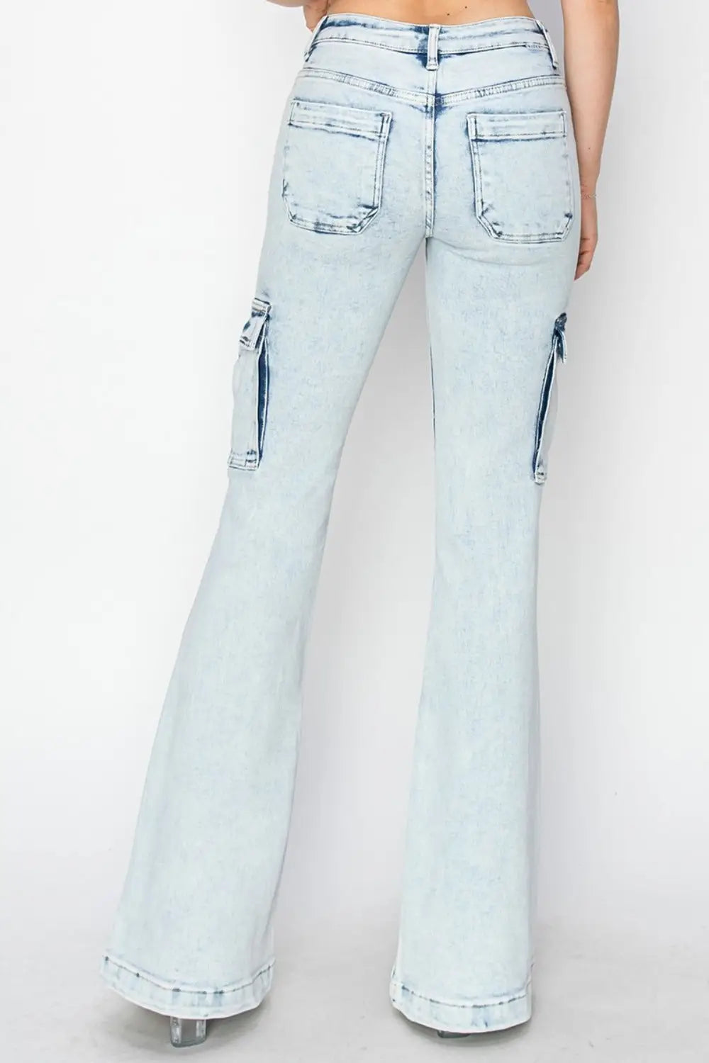 Light wash RISEN high-rise cargo flare jeans with distressed details, perfect flare jeans