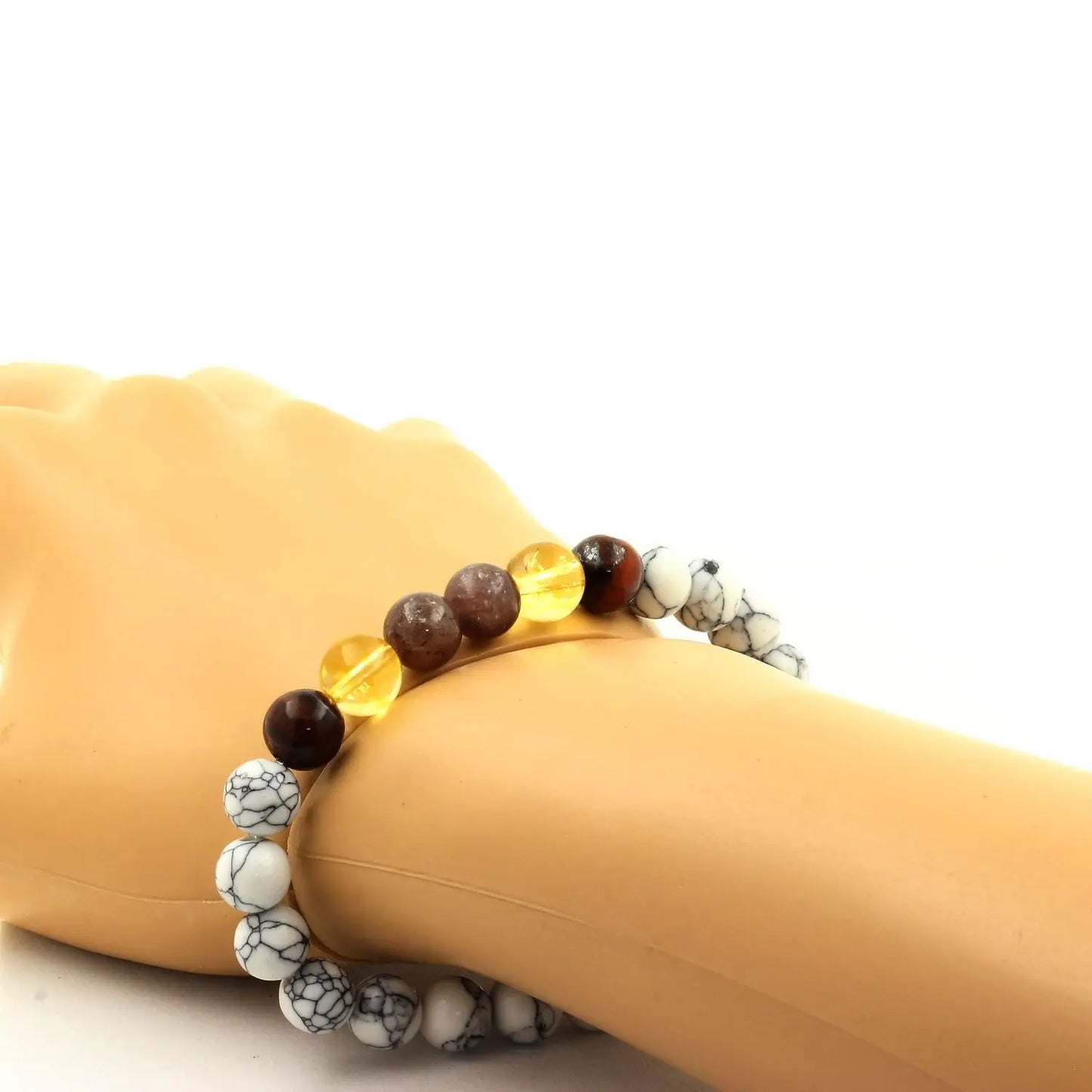 Beaded bracelet with colorful translucent beads and white marbled beads featuring Red Tigers Eye and Ruby Burma