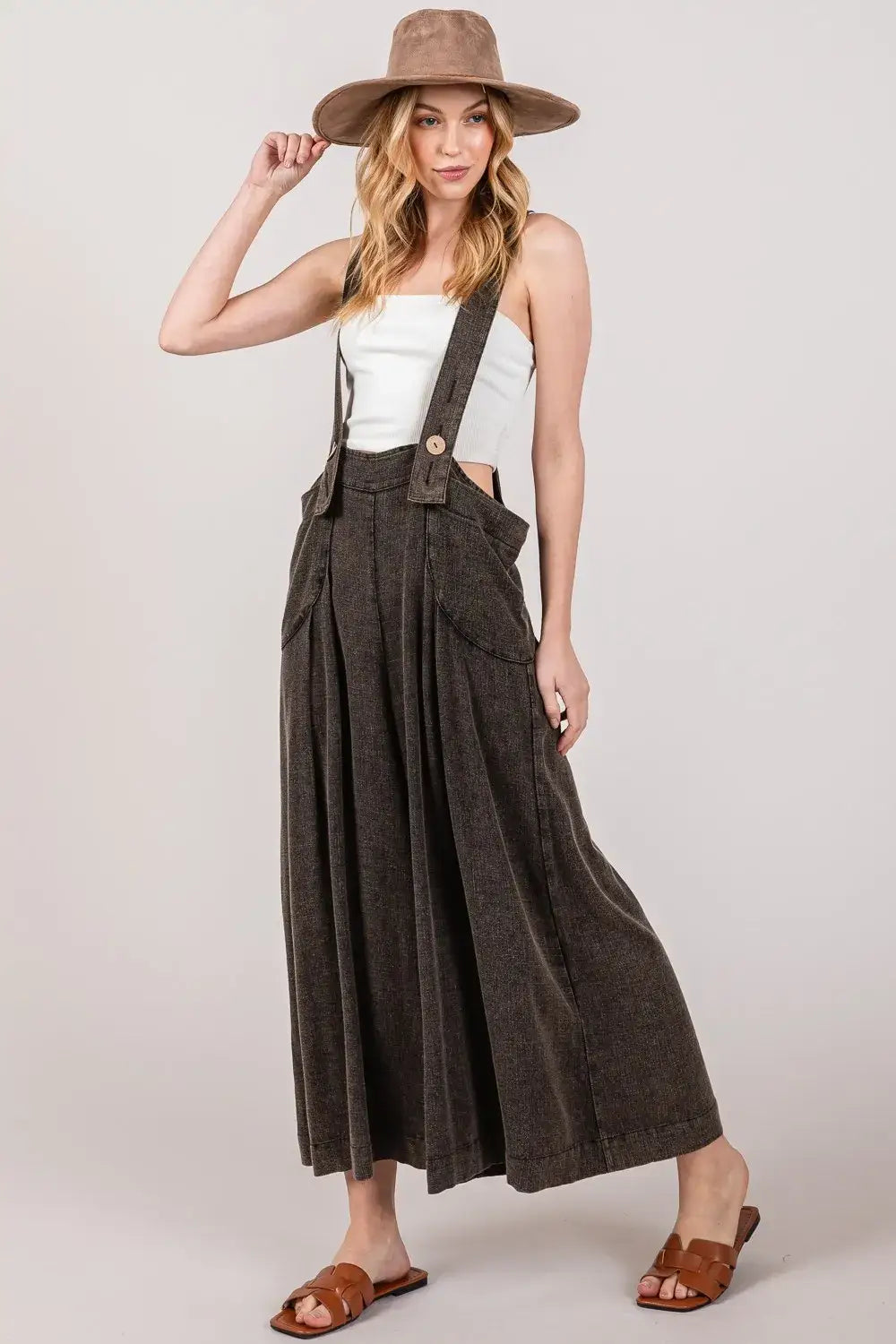 Olive green corduroy wide leg overalls with wide straps and pockets for Sage + Fig