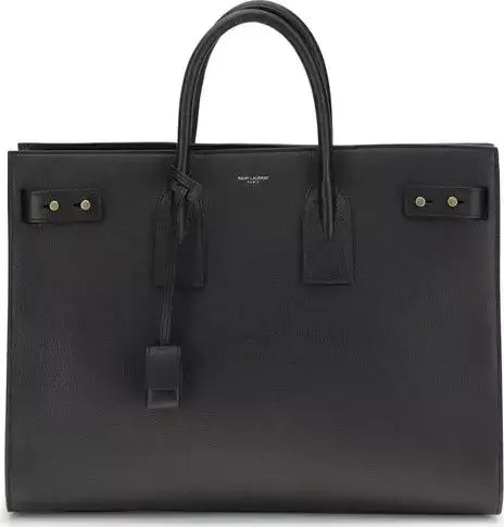Black leather tote bag with top handles from Saint Laurent Sac De Jour collection