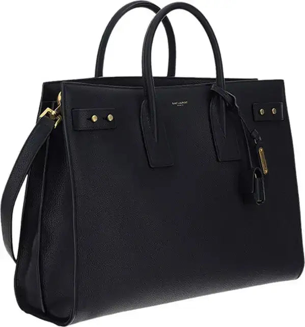 Black leather Saint Laurent Sac De Jour bag with top handles and detachable shoulder strap