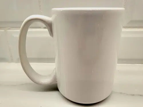 White ceramic coffee mug featuring Seattle Seahawks raised logo design