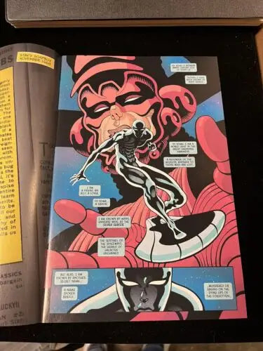 Comic book page featuring Silver Surfer, signed by Donny Cates, from SILVER SURFER BLACK #1