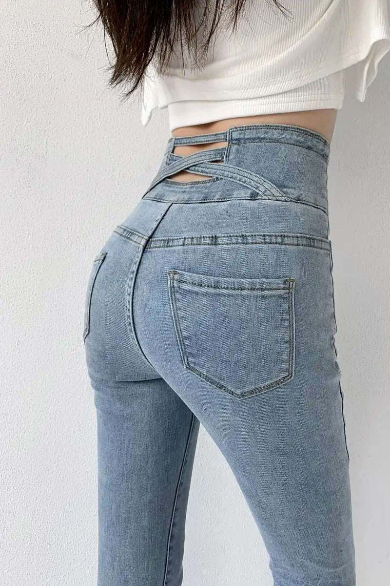 Light blue vintage high waist skinny pencil jeans with criss-cross back detailing