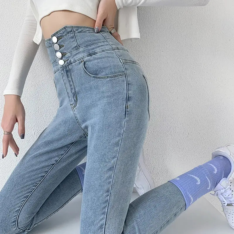Light wash vintage high waist skinny pencil jeans with triple button closure for women