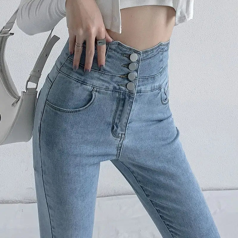 Light blue vintage high waist skinny pencil jeans with four buttons for women