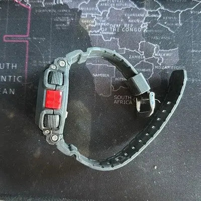 Gray digital sport watch with red button and black buckle, water resistant outdoor wristwatch