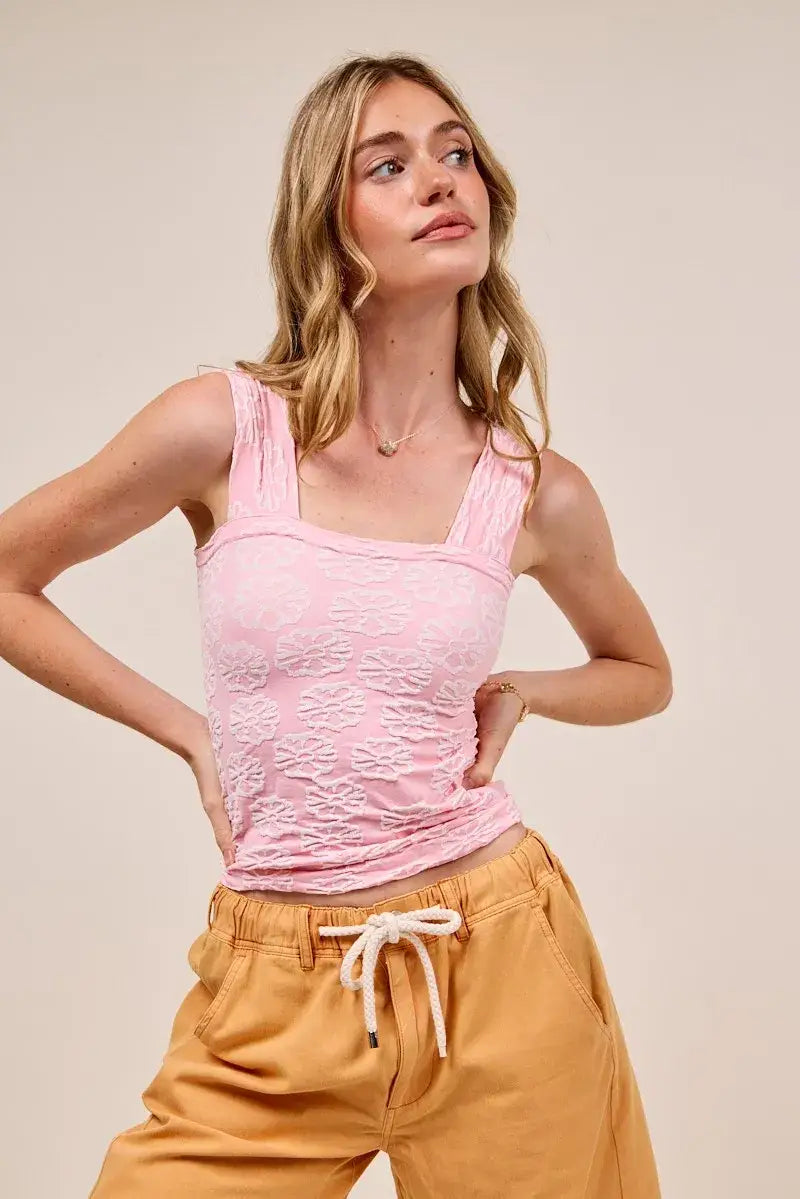 Light pink two-tone floral seamless tank top with textured floral detailing