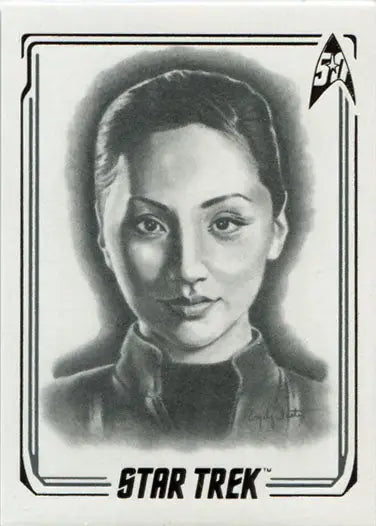 Portrait of a young woman with East Asian features in a Star Trek chase card design