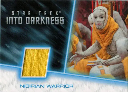 Trading card of a Nibirian Warrior with fabric swatch from Warrior Scarf costume