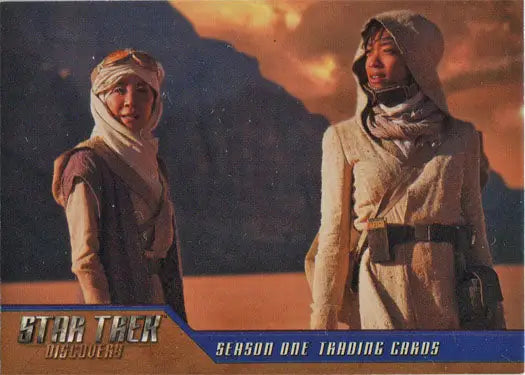 Star Trek Discovery magazine promo card featuring characters in desert attire at sunset