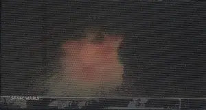 Blurry pinkish-orange cat head shape on Star Wars 3Di chase card for collectors