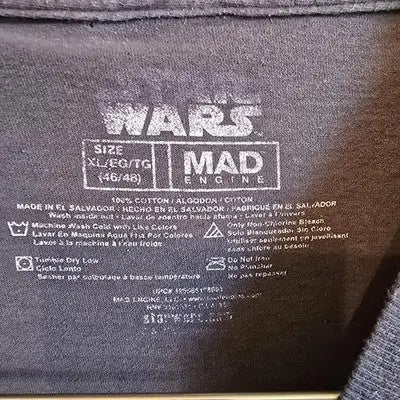 Dark gray Baby Yoda graphic T-shirt with printed label for Star Wars fans