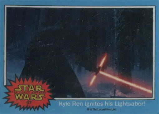 A glowing red cross-shaped lightsaber from Force Awakens trading cards