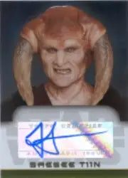 Alien character with pointed ears and textured skin on Jesse Jensen Autograph Card