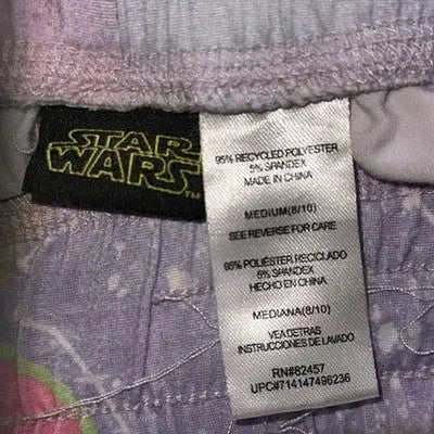 Star Wars Girls Pants with Baby Yoda print, drawstring waist, care, and material info