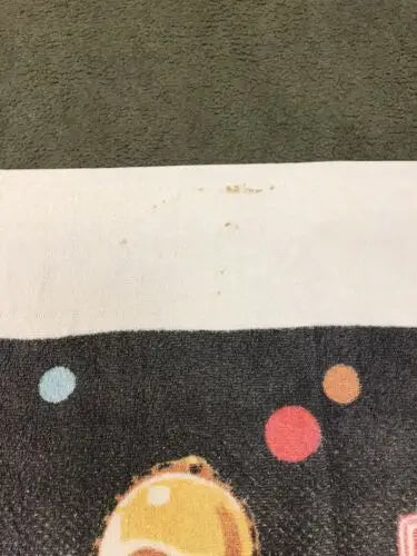 Festive patterned Star Wars towel featuring C3PO and R2-D2 from The Empire Strikes Back