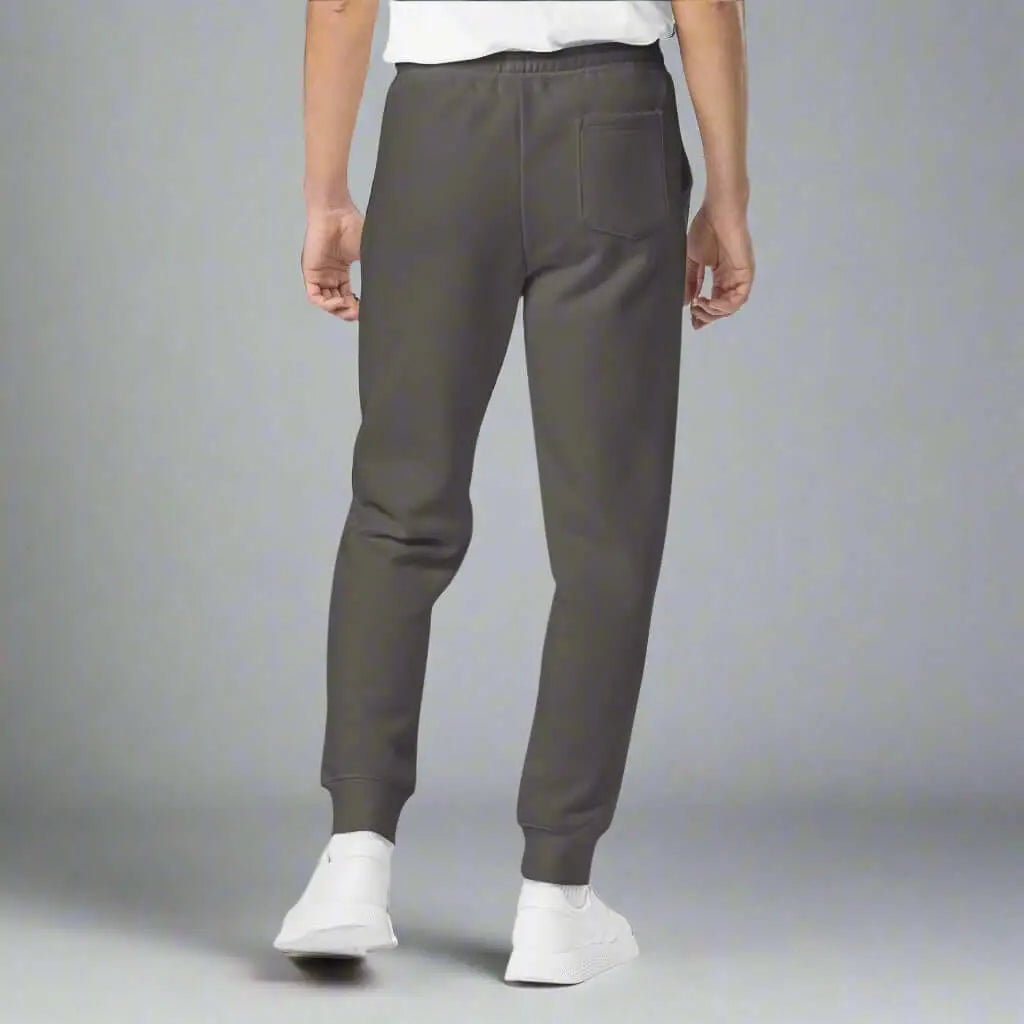 Men’s dark gray Crested Luxe Joggers with elastic waistband, cuffs, and back pocket