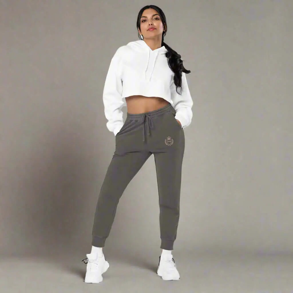 Women’s white cropped hoodie and dark gray crested luxe joggers for a stylish look