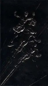 Embossed relief sculpture of a dancing figure on Superman The Man of Steel steel prototype