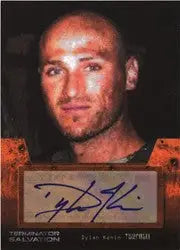 Headshot of Dylan Kenin, bald man, with Terminator Salvation Autograph Card below