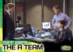 Three men in an office discussing The 4400 Trading Cards and Turf Wars strategy