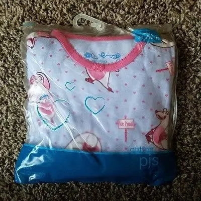 Children’s pajamas size 6 with pink animals hearts and polka dots on light blue fabric