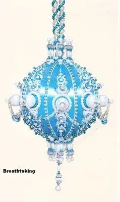 Elaborately decorated blue and white beaded cracker box Christmas ornament kit