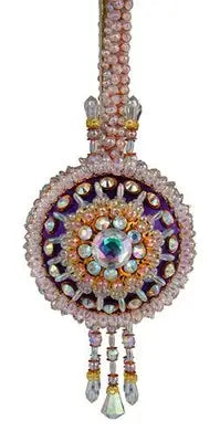 Ornate sparkling purple and pink beaded Christmas ornament with dangling crystals from Cracker Box