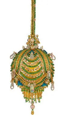 Ornate Christmas ornament from Cracker Box Ornament Kit Melody with green gold turquoise accents