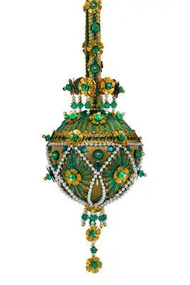 Ornate emerald green and gold cracker box Christmas ornament with beads and jewels