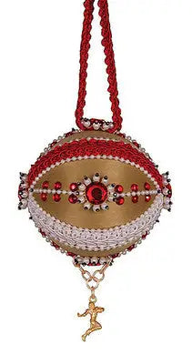 Ornament kit from The Cracker Box Inc with handcrafted red, gold, white trims and beads