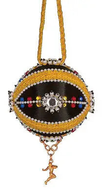Ornate black oval ornament with gold pearl trim and colorful beads from Cracker Box ornament kits