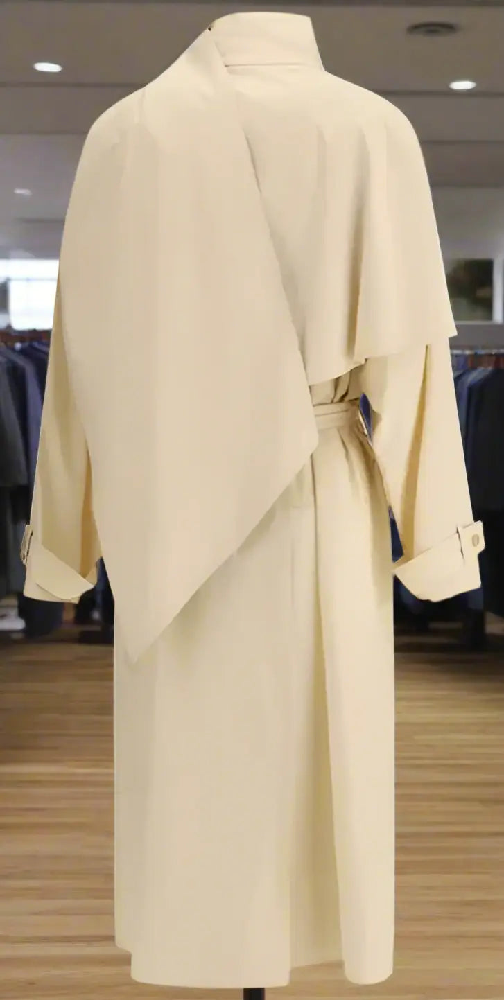 Cream-colored Donette trench coat with partial cape and belted waist in THE ROW BEIGE DONETTE TRENCH COAT