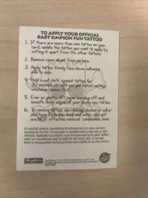 Bart Simpson fun tattoo instructions for the mermaid tattoo on THE SIMPSONS 1993 Skybox MERMAID TATTOO