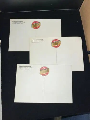 Three white postcards from The Simpsons Bongo Comics postcard card promo set