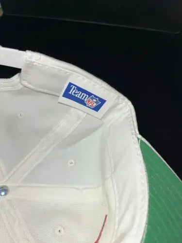 Interior view of a white snapback cap featuring Thurman Thomas and Buffalo Bills design