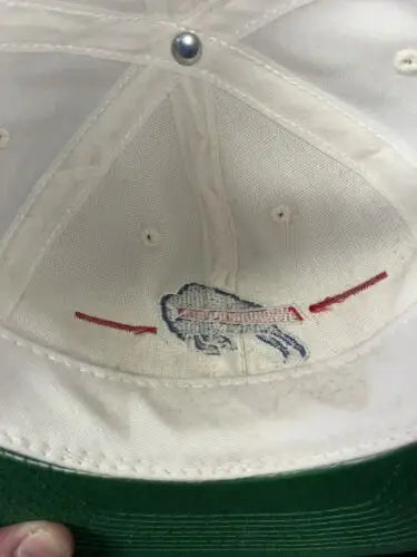 Inside view of a Buffalo Bills Thurman Thomas snapback cap showcasing vintage design