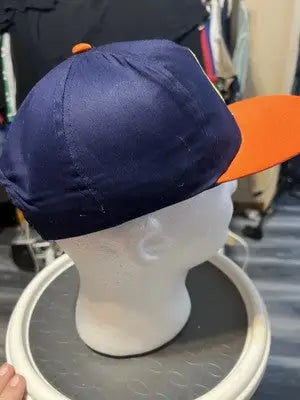 Tide Racing Blue and Orange Snapback Hat featuring a dark blue cap with orange brim