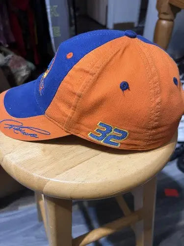 Orange and blue Tide Racing Hat with number 32 embroidered on the side